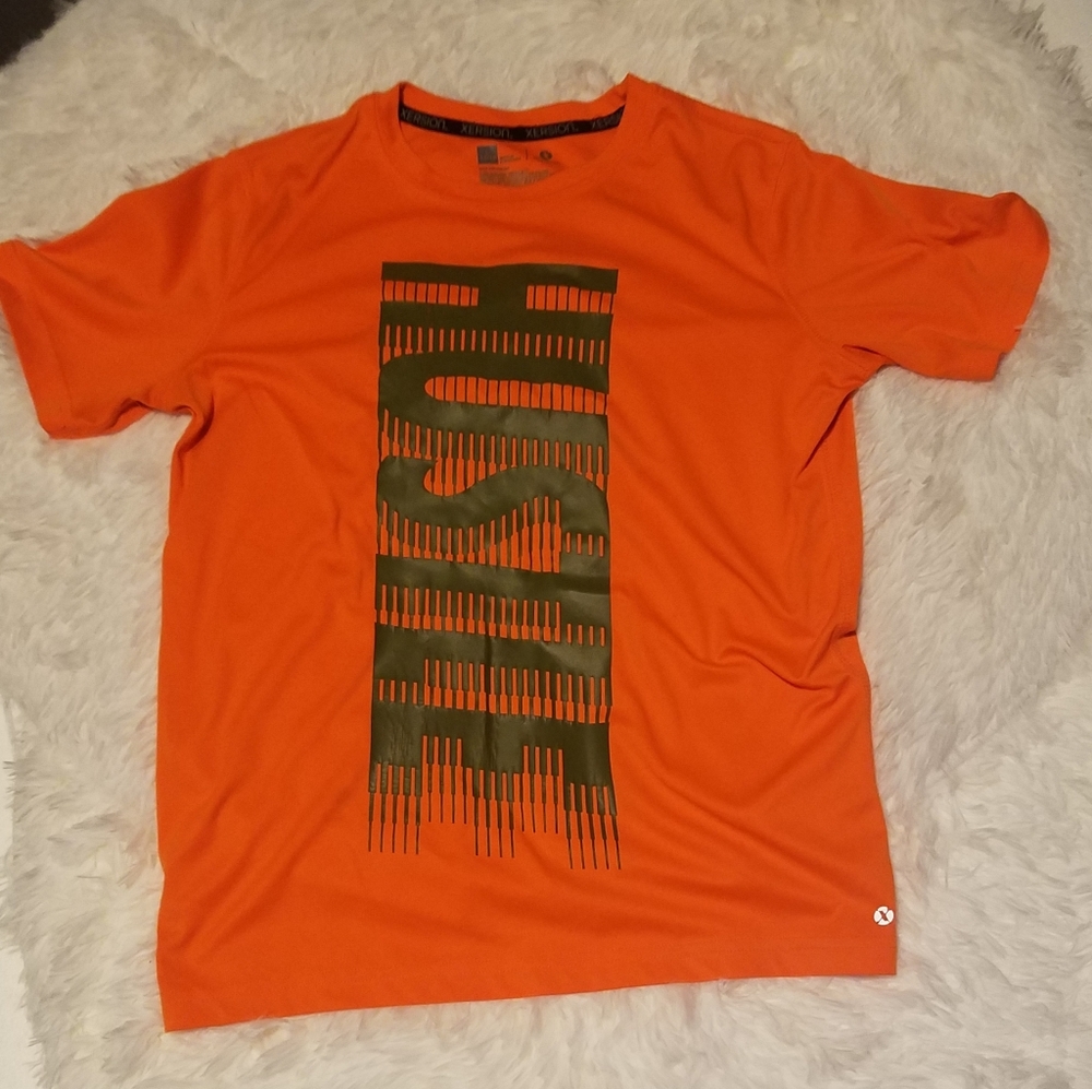 Boy's Orange Xersion T-shirt. Large 14-16.